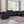 Global United 9762 - Black 8-Piece 4-Power Reclining Italian Leather Sectional with 4 Power Recliners and 2 Consoles